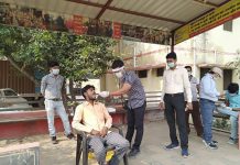 सासनी : स्वास्थ्य विभाग ने कोतवाली चौराहे पर लगाया कोरोना जांच शिविर