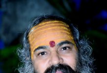सिकंदराराऊ : वटवृक्ष की टहनी तोड़कर परिक्रमा करना निषेध : स्वामी पूर्णानंदपुरी जी महाराज